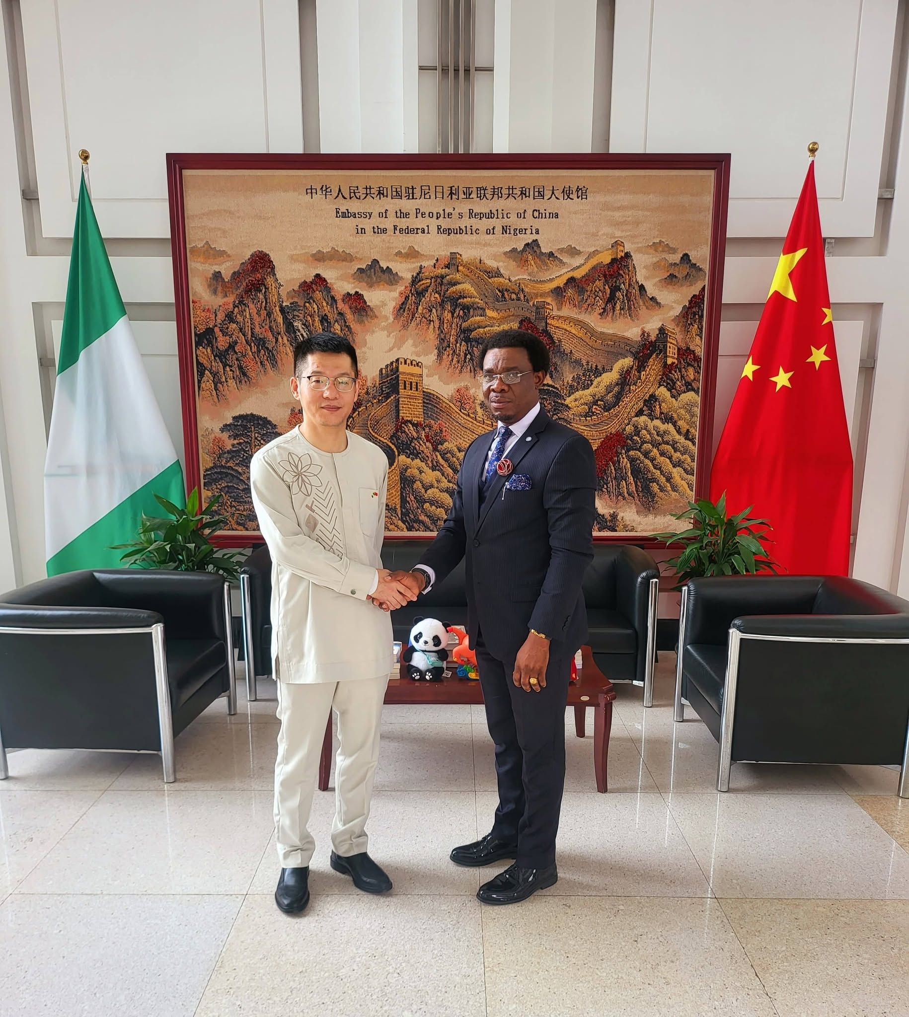 PROF AND CHINESE DIPLOMAT
